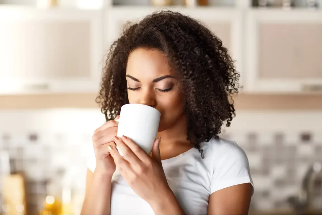 A woman drinking spearmint tea